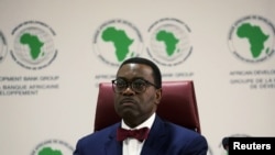 FILE PHOTO: Akinwumi Ayodeji Adesina, President of the African Development Bank Group, attends a meeting of the 2020 African Economic Outlook report in Abidjan, Ivory Coast