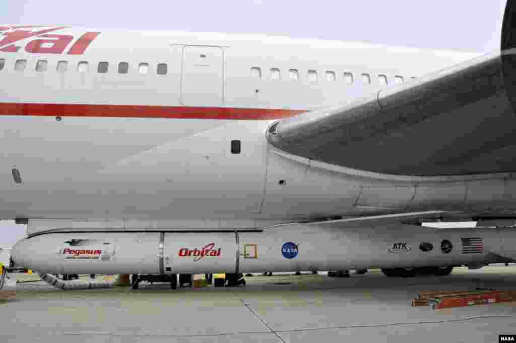 The Orbital Sciences Pegasus XL rocket with NASA's NuSTAR spacecraft is attached to the L-1011 carrier aircraft known as "Stargazer," June 2, 2012. (NASA)