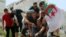 Un manifestant a tenté de s'immoler par le feu pour protester contre l'élite dirigeante à Alger le 12 juillet 2019.