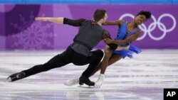 Vanessa James and Morgan Cipres of France perform in the pair skating short program team event at the 2018 Winter Olympics in Gangneung, South Korea, Feb. 9, 2018.