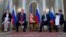 Russian President Vladimir Putin, right, and U.S. President Donald Trump, left, with their interpreters at the beginning of their meeting at the Presidential Palace in Helsinki, Finland, July 16, 2018.