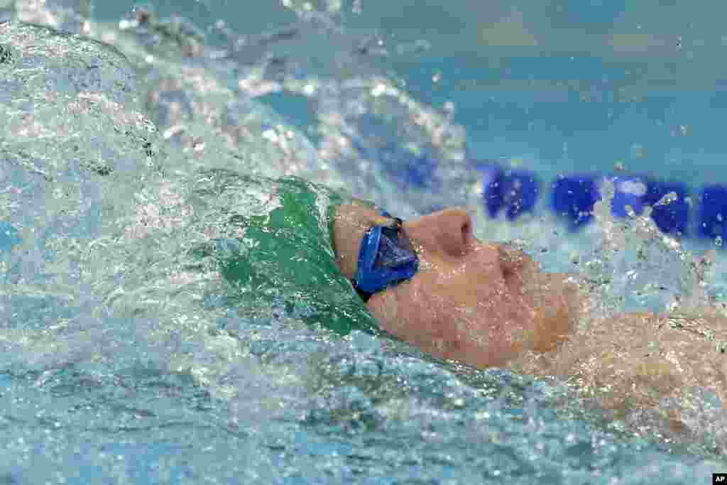 atthew Sates of South Africa swims in a heat of the men's 200-meter individual medley at the 2020 Summer Olympics, Wednesday, July 28, 2021, in Tokyo, Japan. (AP Photo/Martin Meissner)