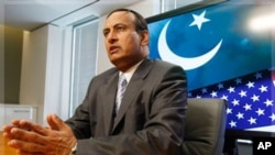 Husain Haqqani, Pakistani Ambassador to the United States, speaks during an interview with The Associated Press in Washington, June 20, 2008.