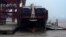 A cargo ship is anchored at a port in Zhoushan, Zhejiang province, Feb. 14, 2016. China's exports fell 11.2 percent in January from a year earlier and imports tumbled 18.8 percent.