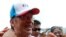 Malaysia's opposition leader Anwar Ibrahim is greeted by his supporters after an election campaign rally in Petaling Jaya outside Kuala Lumpur, May 1, 2013. 