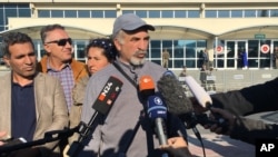 Ali Riza Tozlu, father of jailed German journalist Mesale Tolu, talks to the media outside a court in Silivri, Turkey, Oct. 11, 2017. 