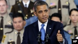 President Barack Obama speaks about his gun violence proposals at the Minneapolis Police Department's Special Operations Center in Minneapolis, where he outlined his plan before law enforcement personnel, February 4, 2013.