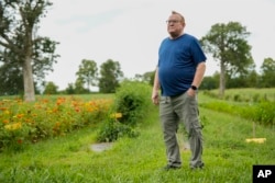 Tom Kimmerer, plant physiologist, poses for a portrait, Tuesday, Aug. 15, 2023, at Elmwood Stock Farm in Georgetown, Ky. (AP Photo/Joshua A. Bickel)