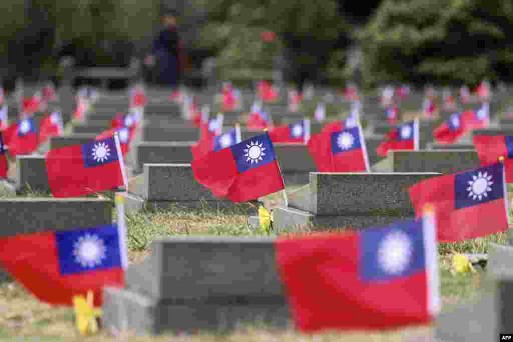 Flags of Taiwan are seen at a public cemetery during a ceremony commemorating the 75th anniversary of the Battle of Guningtou in Kinmen.