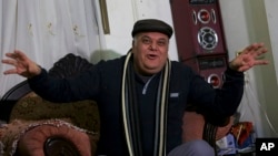 Palestinian actor and playwright Ali Abu Yaseen, 55, gives an interview in his home at the Shati refugee camp in Gaza City, Jan. 29, 2019.