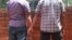 FILE - A Kenyan gay couple is seen holding hands. Homosexuality is illegal in at least 36 African countries, including Kenya. Penalties include prison and fines. (VOA / R. Ombuor)