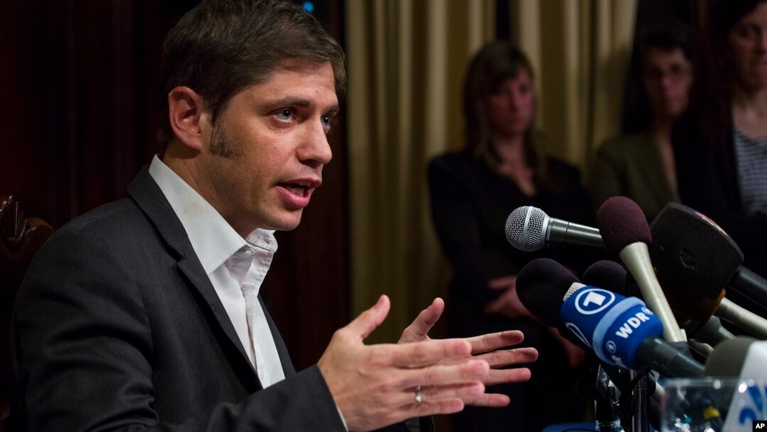 Axel Kicillof, Argentina's economy minister, addresses member of the news media after a negotiation session at the Argentinean Consulate in New York, July 30, 2014.
