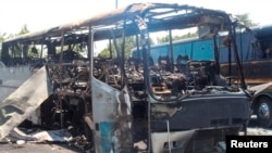 A bus that was damaged in a bomb blast is seen outside Burgas Airport, about 400km (248miles) east of Sofia, Bulgaria, July 19, 2012.