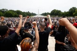 Demonstrators protest June 6, 2020, at the Lincoln Memorial in Washington, over the death of George Floyd, a black man who was in police custody in Minneapolis.