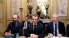 France's President Emmanuel Macron, center, France's Prime Minister Edouard Philippe, left, and France's Finance Minister Bruno Le Maire, right, attend a meeting with the representatives of the banking sector at the Elysee Palace, in Paris, Dec.11, 2018.