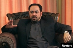 FILE - Salahuddin Rabbani speaking during an interview in Kabul, June 27, 2012.
