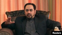 FILE - Salahuddin Rabbani speaking during an interview in Kabul, June 27, 2012.