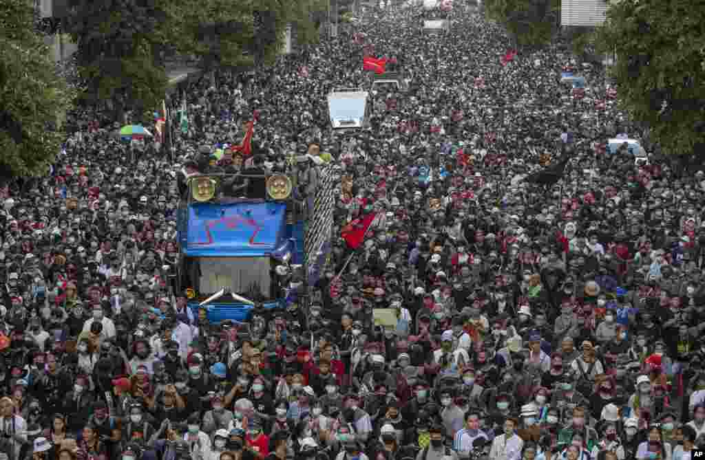 Pro-democracy protesters march in Bangkok, Thailand.&nbsp;Thousands of anti-government protesters gathered for a rally being held on the anniversary of a 1973 uprising that led to the ousting of a military dictatorship.