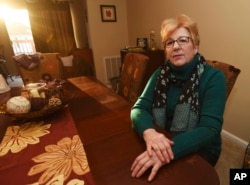 Wendy Kline, a hairstylist who voted for Donald Trump, poses for a photo in Harrisburg, Pa. Older Americans who buy their own health insurance would have been among the groups hardest hit under the Republican plan to overhaul the Affordable Care Act. Kline tried buying a policy on the federal exchange but earned too much to qualify for a government subsidy. So she was stuck paying the market rate.