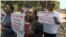 Teachers demanding to be paid in U.S. dollars take to the streets in Harare, Zimbabwe, Nov. 9, 2018. 