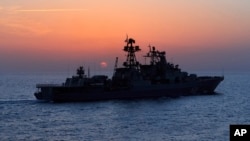 FILE - The Russian navy destroyer Vice Admiral Kulakov is seen on patrol in the eastern Mediterranean. Xinhua said the theme of this year's drills was "joint rescue and protection of maritime economic activities".