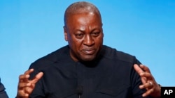 FILE - Ghana's President John Dramani Mahama, seen here delivering a speech in Paris, France, Nov. 10, 2015, might face a challenge from an opposition alliance in upcoming presidential, parliamentary and local elections.