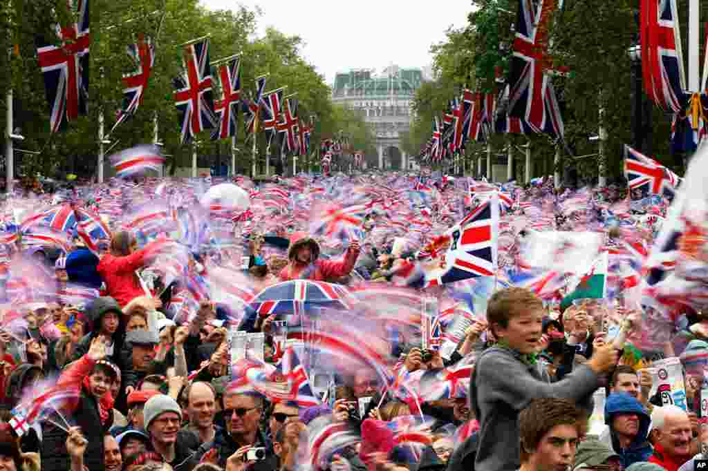 June 5: Revelers in London watch Britain's Queen Elizabeth appear on the Buckingham Palace balcony as part of Diamond Jubilee celebrations to mark the 60th anniversary of her accession to the throne.