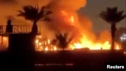 عکس آرشیوی از حمله به یک مرکز دیپلماتیک آمریکا در بغداد - ۲۹ اسفند ۱۴۰۴