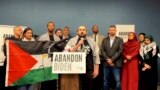 FILE—In this image taken from video, Muslim community leaders from several swing states pledge to withdraw support for U.S. President Joe Biden on Saturday, Dec. 2, 2023, at a conference in Dearborn, Mich., citing his refusal to call for a cease-fire in Gaza.
