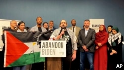 FILE - In this image taken from video, Muslim community leaders from several swing states pledge to withdraw support for U.S. President Joe Biden on Dec. 2, 2023, at a conference in Dearborn, Mich.