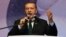 Turkey's Prime Minister Tayyip Erdogan addresses his supporters in Istanbul, May 12, 2013. 