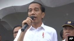 Indonesia's President Joko "Jokowi" Widodo speaks in Tringgading, Aceh, province, Indonesia, Dec. 9, 2016.