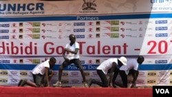 A group of South Sudanese youth participating in the Bidibidi got talent 2017 show in Yumbe, Uganda, Dec. 16, 2017. (H. Athumani/VOA)