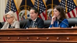 Rep. Jamie Raskin, D-Md., center, flanked by Rep. Liz Cheney, R-Wyo., left, and Rep. Elaine Luria, D-Va., speaks as the House panel investigating the Jan. 6 U.S. Capitol insurrection meets to vote on Dec. 13, 2021.