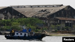 The facade of a Navy ammunition warehouse which was damaged by an explosion in Jakarta, March 5, 2014.