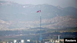 FILE - A North Korean flag is seen on top of a tower near the truce village of Panmunjom in the demilitarised zone (DMZ) separating North Korea from South Korea, about 55 km north of Seoul.