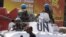 Soldiers with the UN peacekeeping force sit on top of an armored personnel carrier in the center of Goma, Eastern DRC, December 6, 2008. 