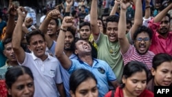 FILES - Members of the Bangladeshi Hindu community chant slogans against violence reportedly targeting the country's minorities during a protest in Dhaka on Aug. 9, 2024, days after a student-led uprising ended the 15-year rule of Sheikh Hasina.