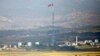 FILE - A North Korean flag is seen on top of a tower near the truce village of Panmunjom in the demilitarised zone (DMZ) separating North Korea from South Korea, about 55 km north of Seoul.