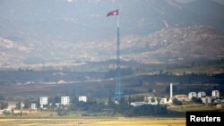 FILE - A North Korean flag is seen on top of a tower near the truce village of Panmunjom in the demilitarised zone (DMZ) separating North Korea from South Korea, about 55 km north of Seoul.