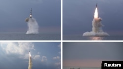 북한이 지난 10월 신형 잠수함발사탄도미사일(SLBM) 시험 발사에 성공했다며 관영매체를 통해 공개한 사진.