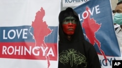 Muslim protesters call for an end to violence against ethnic Rohingya in Rakhine State of Burma, in Jakarta, Indonesia, July 26, 2012.