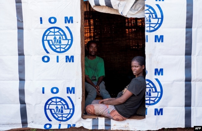 Displaced Oromos sit in a temporary shelter at Banco Chelchele site in West Guji Ethiopia, July 31, 2018.