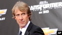 FILE - executive producer and director Michael Bay attends the "Transformers: Dark Of The Moon" premiere in Times Square in New York.