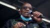 (FILES) In this file photo taken on July 04, 2021 Former South African president Jacob Zuma addresses his supporters in front of his rural home in Nkandla for the first time since he was given a 15-months sentence for contempt of court. - South…