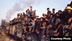 Cambodians on a train that connected Phnom Penh to different provinces in Cambodia, file photo taken in 1980's. (Courtesy of John Burgess)