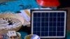 A miniature solar energy panel at the Refugee Forum in Geneva. (Lisa Bryant/VOA)