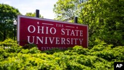 FILE - A sign for Ohio State University in Columbus, Ohio, is seen in this May 8, 2019, photo.