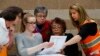 A challenge is reviewed on a ballot during a statewide presidential election recount in Waterford Township, Mich., Dec. 5, 2016. 