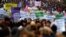 Thousands of people take part in a protest against sexism and gender violence, in Madrid, Spain, Nov. 25, 2018.
